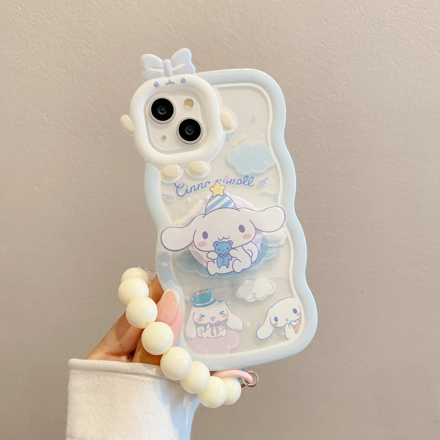 Kawaii Sanrio Cinnamoroll Handyhülle mit Armband für iPhone 15, 14, 13, 12, 11 Pro Max, XR, XS Max, X und 7 – Rückenschale im Y2K-Stil, perfektes Geschenk!"